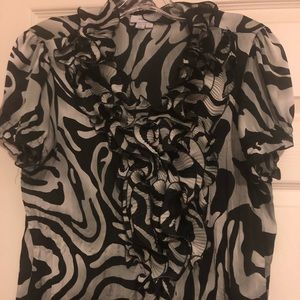 Ruffle shirt in great condition.